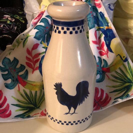 Old Milk Jug Bank crazed with age, Featuring aBlue Rooster